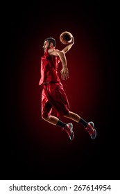 Isolated On Black Basketball Player In Action Is Flying High 