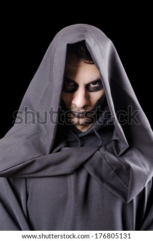 Isolated on black dark guy portrait costume