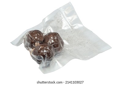 isolated on a white background are three balls of Belper Knoll cheese in a vacuum package. Hard Swiss cheese in the form of small balls, sprinkled with black pepper. side view.