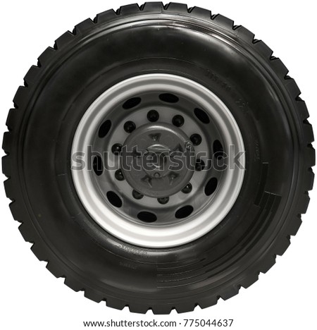 Isolated on white new rear truck wheel on hub with black shine tire. New clean tractor truck wheel tire. Wheel mud tire on rim on rear axle. High resolution truck wheel isolated