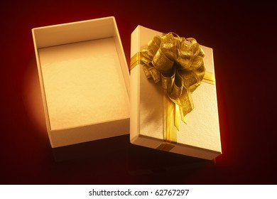 Isolated Open Gift Box With Gold Ribbon