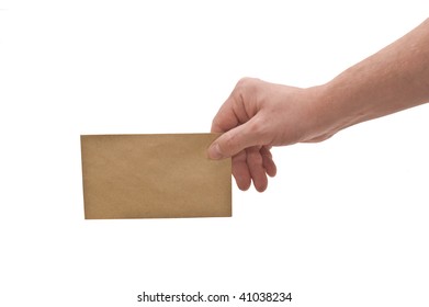 An Isolated Over White, Caucasian Man's Hand Holding A Small Brown Mottled Envelope