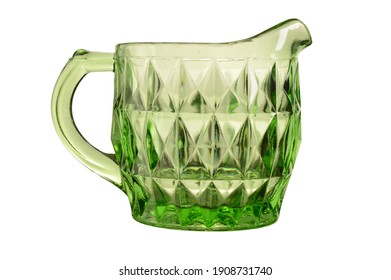 An isolated over white image of a Green Uranium Depression glass cream jug.