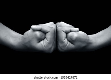 Isolated Pair Of Hands Of A Male Teenager On Black Background Doing Brahma Yoga Mudra.Horizontal Shot.