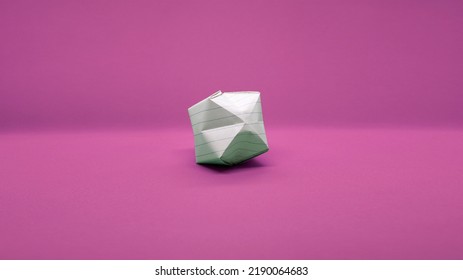 Isolated Paper Ball, Folding Paper, Origami With Plain Pink Background                      