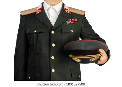Isolated Photo On White Background Of A Military Officer In Uniform Suit Holding A Peaked Cap, Torso View.