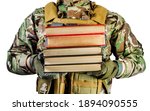 Isolated photo of a soldier in uniform holding stack of books on white background, front view.