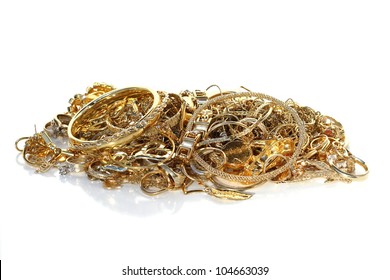 Isolated Pile Of Gold Jewelry On White Background (chains, Necklaces, Bracelets, Earrings, Rings And Other Scrap Gold).