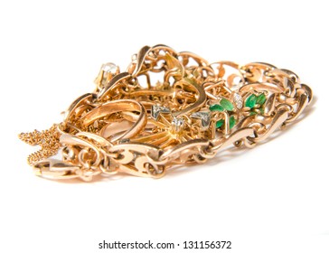 Isolated Pile Of Gold Jewelry On White Background (chains, Necklaces, Bracelets, Earrings, Rings And Other Scrap Gold).