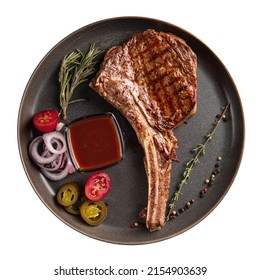 Isolated Plate Of Grilled Beef Steak Bone On White Background