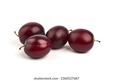 Isolated plums. One and a half of blue plum fruit, isolated on white background