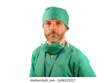 Isolated Portrait Of Attractive And Handsome Medicine Doctor Or Hospital Nurse Man In Surgical Bouffant Hat And Medical Scrub Looking Serious And Intense In Health Care And Specialist At Work Concept