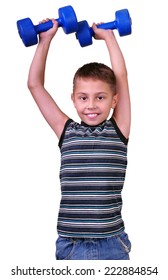 Isolated portrait of elementary age with dumbbells exercising . Childhood, sports, strength, active lifestyle concept