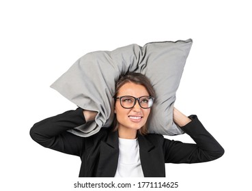 Isolated Portrait Of Frustrated Young Businesswoman In Glasses Covering Her Ears With Pillow. Concept Of Noisy Environment And Importance Of Rest