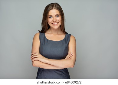 Isolated portrait of smiling  business woman with crossed arms. - Shutterstock ID 684509272