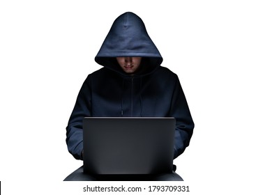 Isolated portrait of unrecognizable young hacker in black hoodie using laptop. Concept of cyber security and data protection