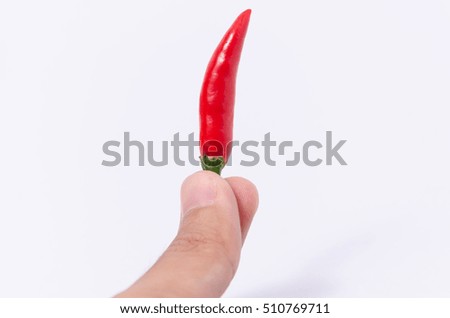 Isolated of red chilli in human hand on white backgorund