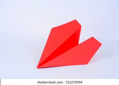 Isolated Red Paper Plane On White Background.