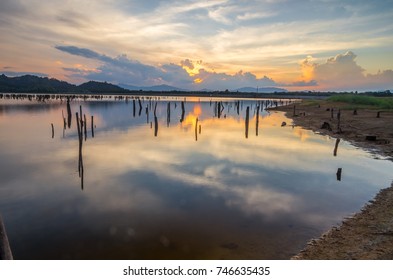 isolated reflection lake sun down.