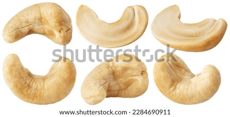 Isolated roasted cashew nuts. Collection of roasted cashew nuts and halves, different angles isolated on white background with clipping path