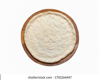 Isolated rolling out the raw dough on a wooden board. Cooking pizza. - Powered by Shutterstock