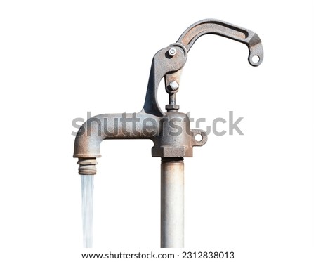Isolated running water from faucet tab. Close up of flowing water from a on old outdoor water tab. Concept for safe accessible drinking water. Selective focus. White background.