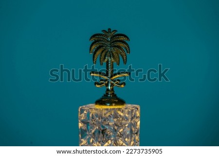 Isolated Saudi Arabia trophy Icon represents palm trees and sword symbol
