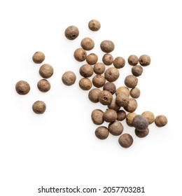 Isolated scattering of allspice on white background 