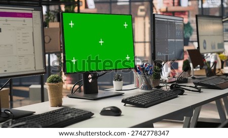 Isolated screen computer displays in customer support workplace, panning shot. Chroma key PC monitors in empty call center office where unsatisfied customers call to solve technical problems