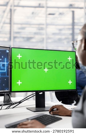 Isolated screen PC and AI deep learning in PCB factory office used by engineer to optimize hardware. Specialist uses artificial intelligence and chroma key computer to improve manufacturing, close up