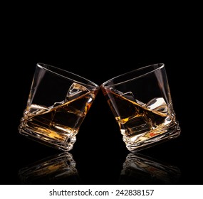 Isolated Shots Of Whiskey Glasses On Black Background