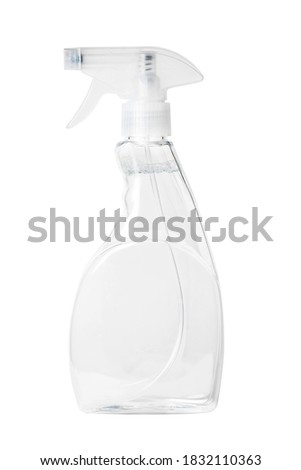 Isolated side view of the clear spray bottle with a clear liquid inside with clipping path.
