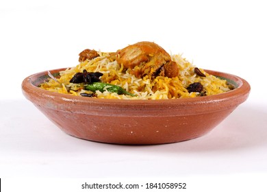 Isolated Side View Of Delicious Spicy Chicken Biryani In Traditional Bowl On White Background, Indian Or Pakistani Food. Special Dinner For Christmas, Eid, Holy And Diwali.