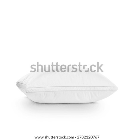 An isolated side view of a fluffy white down-alternative bed pillow with gusseted piping edges, perfect for showcasing comfort and loft in a studio product shot.