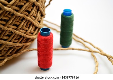 Isolated spool of thread, close up.