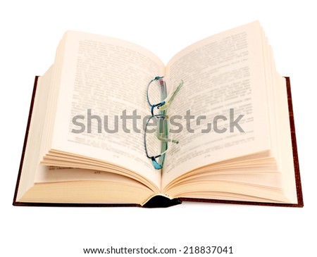 Isolated stack of books with glases