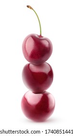 Isolated stack of cherries. Pyramid of three fresh cherries on top of each other isolated on white background