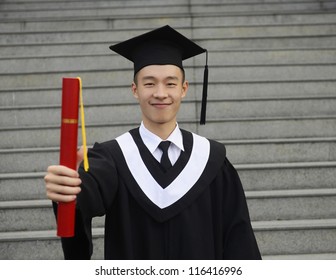 Isolated Studio Picture From A Young Graduation Man