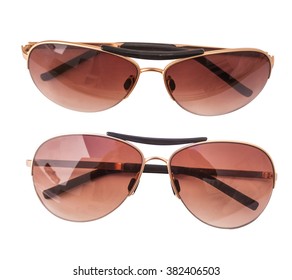 Isolated Sun Glasses On White Background, Top View, Unisex (male And Female Glasses)