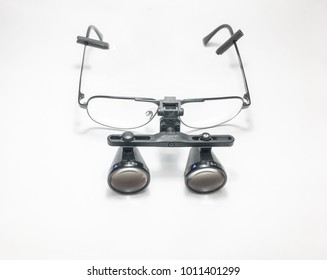 Isolated Of Surgeon Glasses With Lens Loupes.