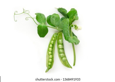 Isolated sweet green peas (beans) with green leaves. Top view. White background.