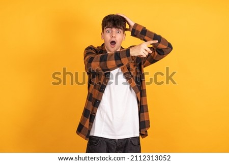 isolated teenager with surprised expression