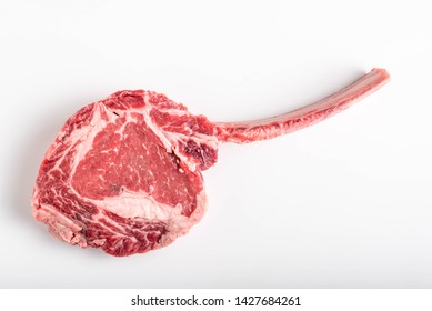 Isolated Tomahawk Ribeye Steak On White Background