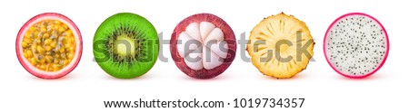 Isolated tropical fruits slices. Fresh exotic fruits cut in half (maracuya, kiwi, mangosteen, pineapple, dragonfruit) in a row isolated on white background with clipping path