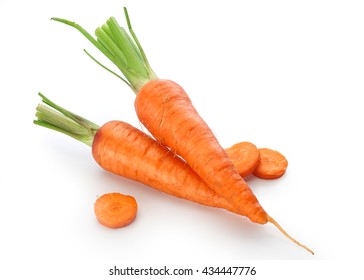 Isolated two fresh whole raw carrots with slices of carrot on the white background - Powered by Shutterstock