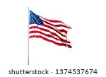 Isolated USA Flag with stars and stripes waving in wind on flag pole against white background.