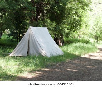 Isolated Vintage Canvas Tent On Dirt Road.