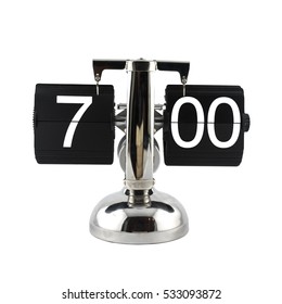 Isolated Vintage Flip Clock On White Background At Seven O'clock