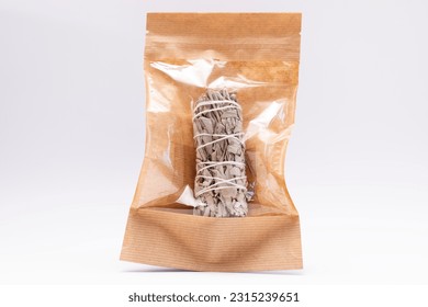 Isolated White Sage Smudge Stick In Paper Package On White Background. Horizontal Plane. Spiritual Incense For Energy Clearing And Healing. High quality photo - Shutterstock ID 2315239651