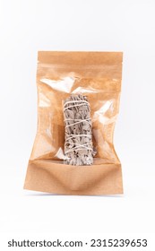 Isolated White Sage Smudge Stick In Paper Package On White Background. Vertical Plane. Spiritual Incense For Energy Clearing And Healing. High quality photo - Shutterstock ID 2315239653